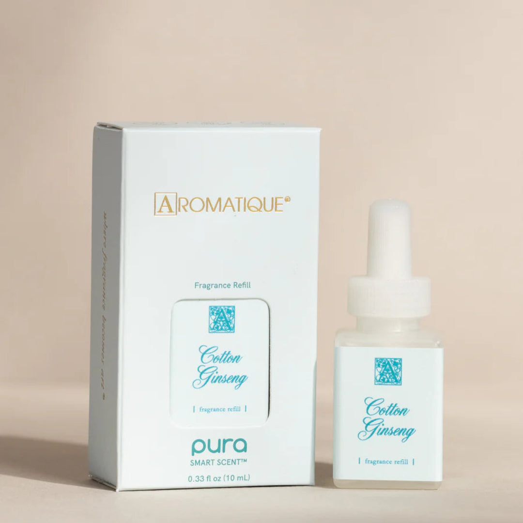 Pura Aromatique Cotton Ginzing fragrance bottle and packaging on a beige background