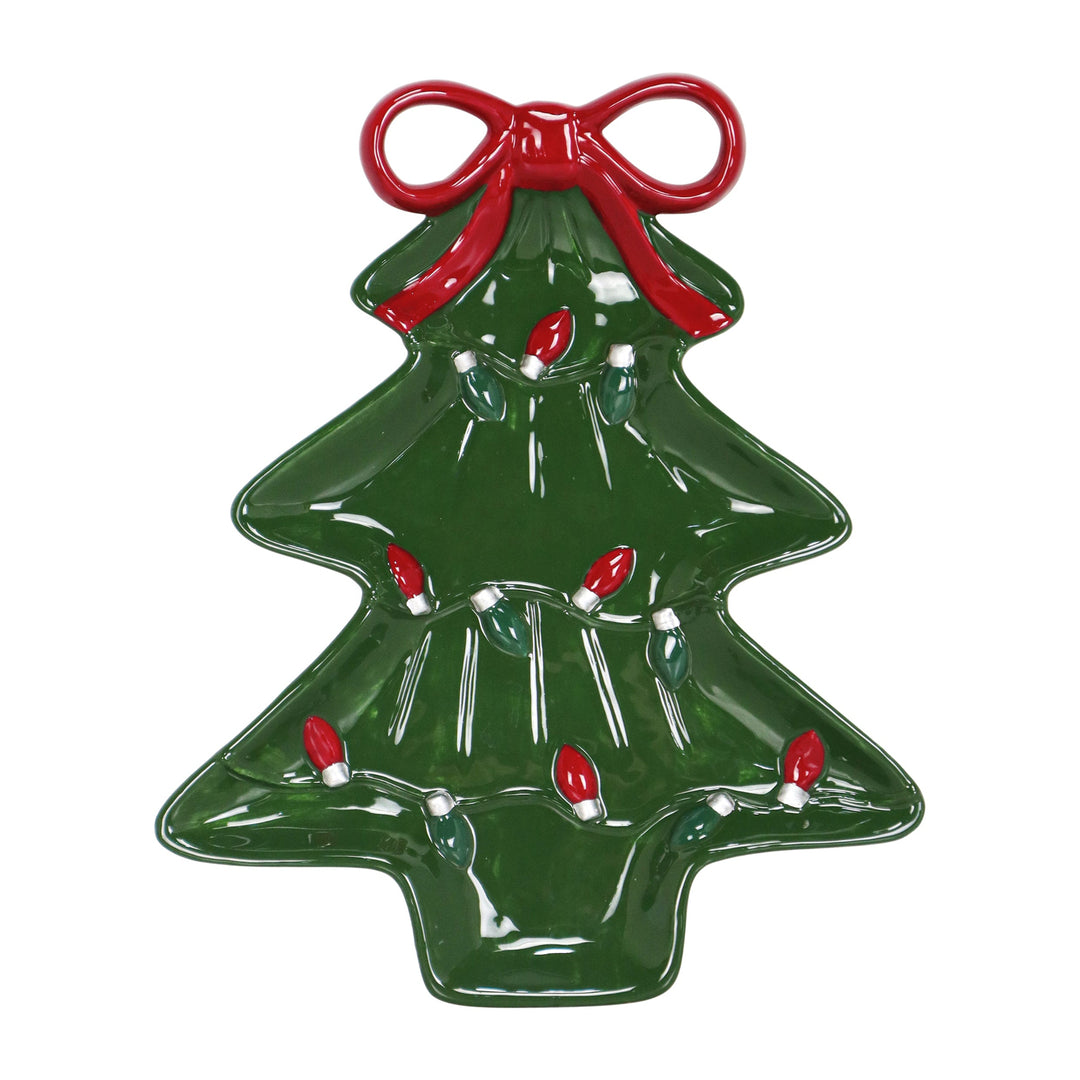 A glossy green Christmas tree-shaped ceramic ornament or decorative piece with a red bow at the top and red and white holiday light details, shown on a plain white background.