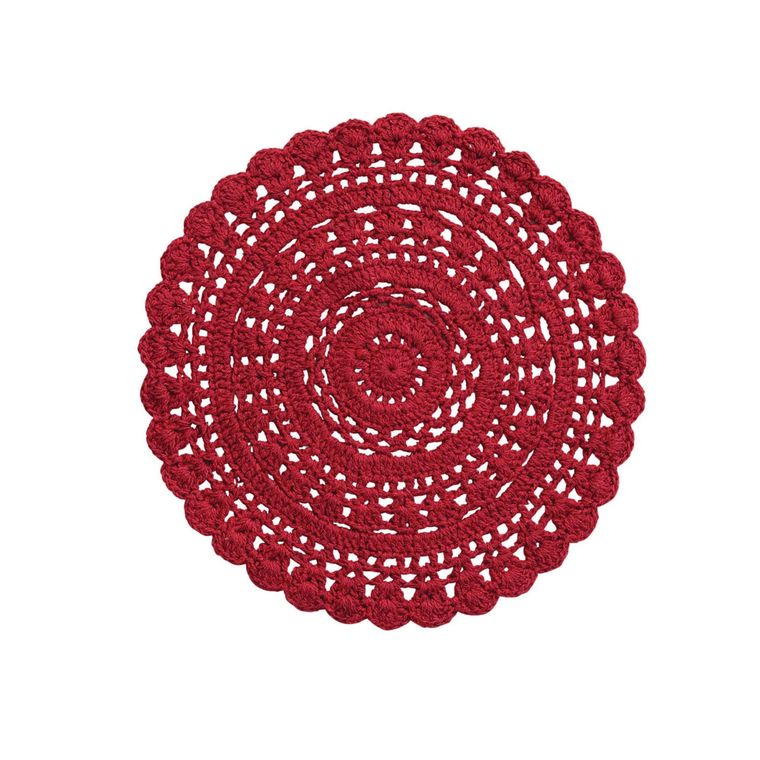 Red crocheted doily on a white background