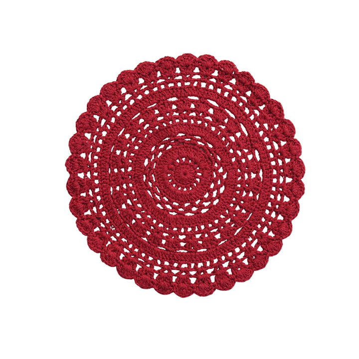 Red crocheted doily on a white background
