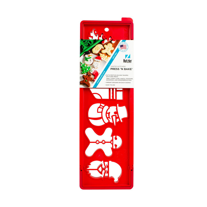 A red Hetcher Press 'N Bake cookie cutter set in its retail packaging, featuring three white plastic cutter templates for cookies: a Santa Claus, a gingerbread man, and a snowman.