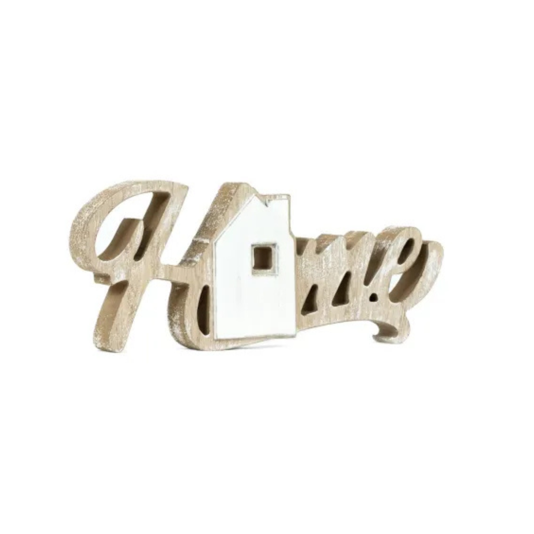 Decorative metal key-shaped house ornament on a white background