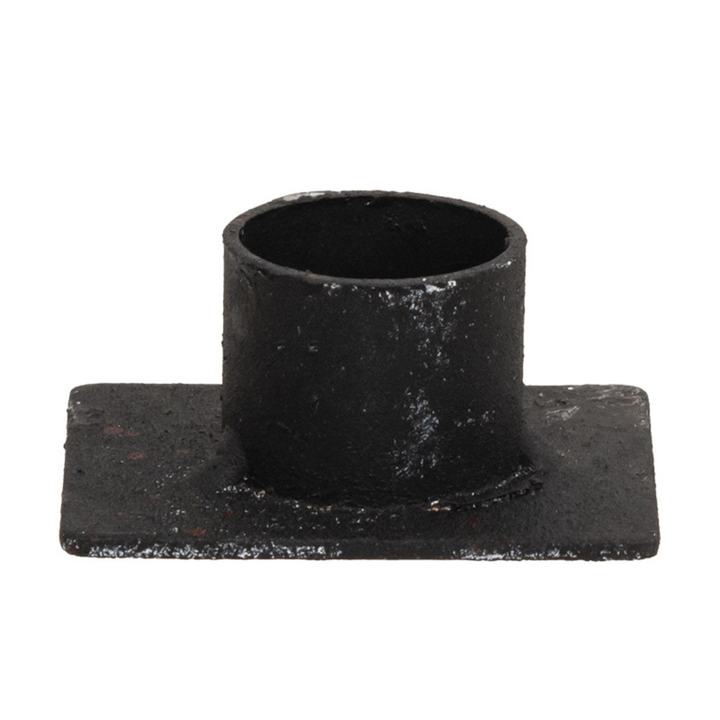 Black metal fitting on a white background