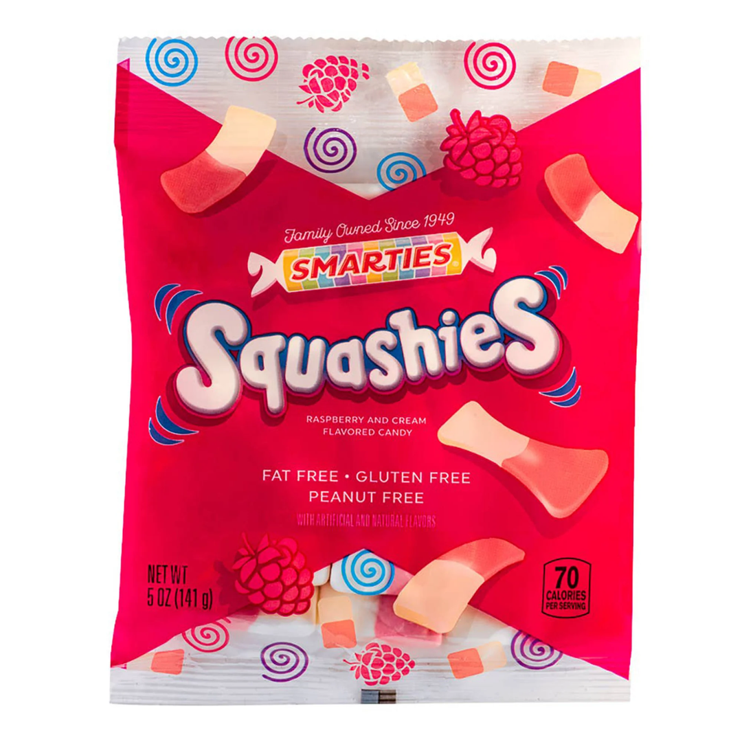 A 5 oz bag of Smarties Squashies Raspberry and Cream flavored candy, featuring a bright red and white design with illustrations of raspberries and candy pieces.