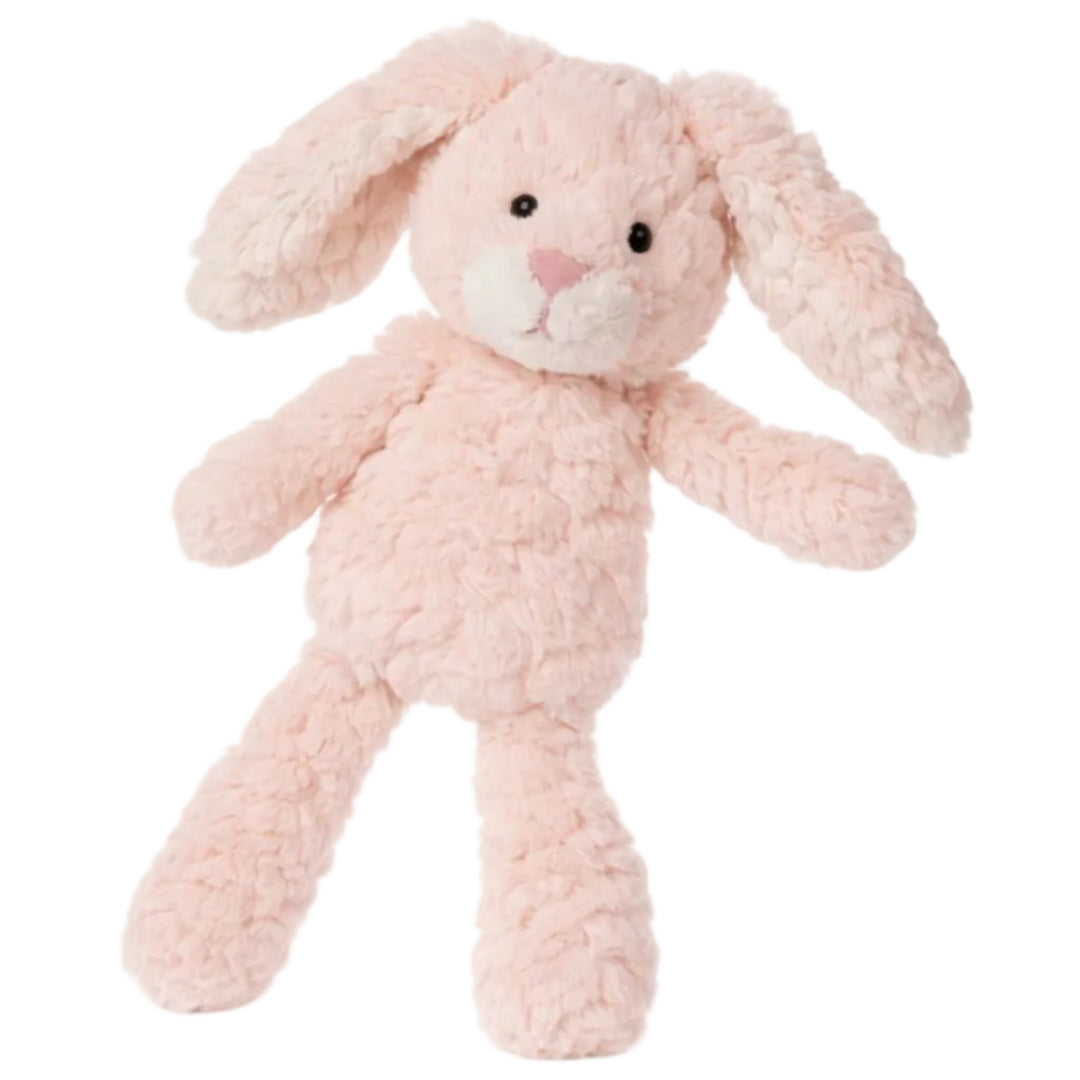 Pink plush bunny toy on a white background