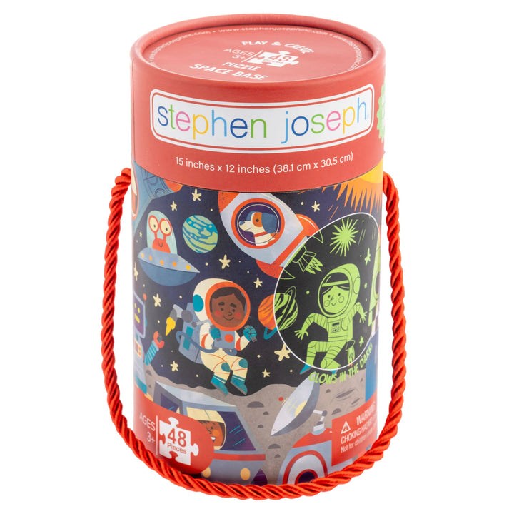 Stephen Joseph space-themed cylindrical product packaging with colorful illustrations on a white background