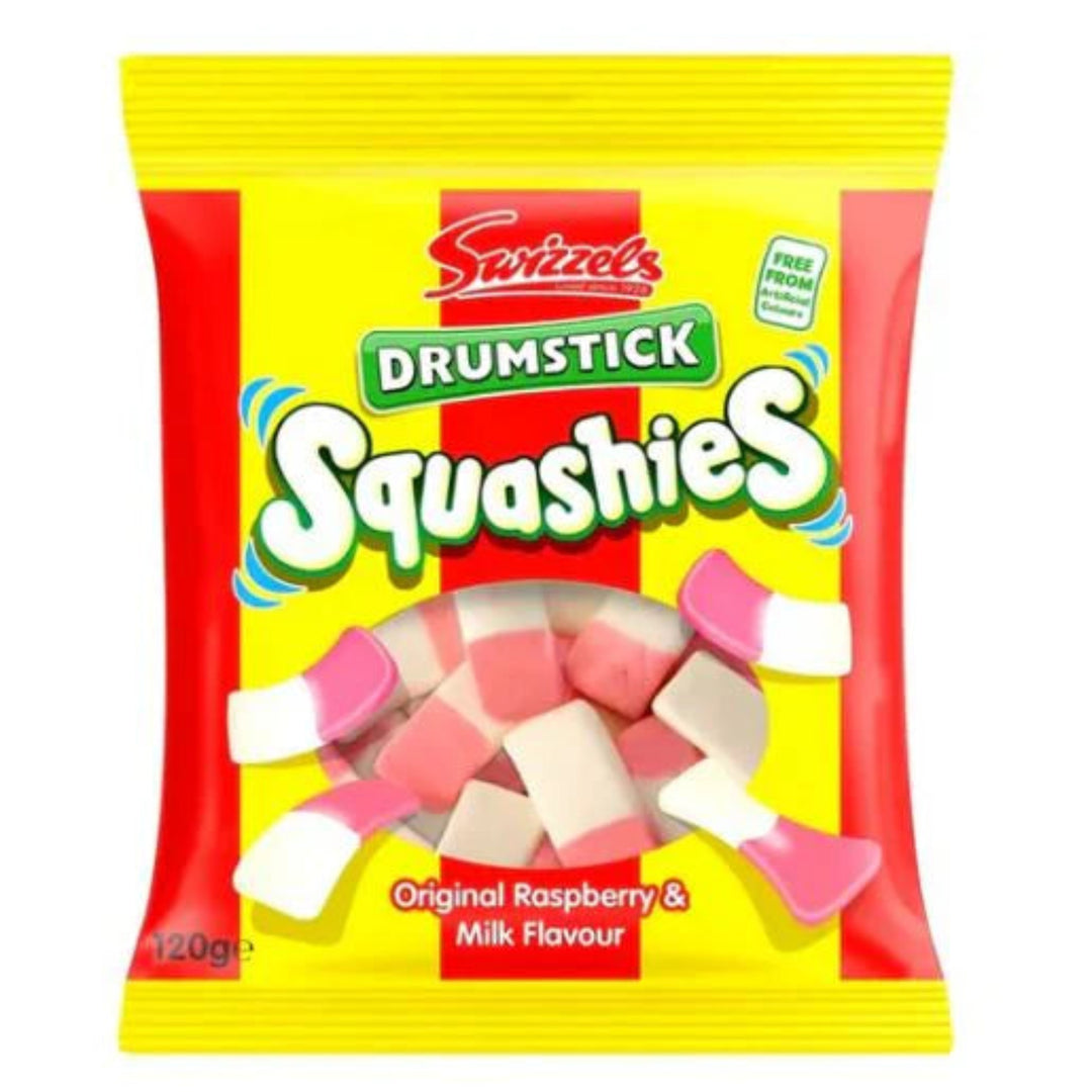A 120g bag of Swizzzo's Drumstick Squashes Original Raspberry & Milk Flavour candy, featuring a bright yellow and red packaging design with a clear window showing the pink and white drumstick-shaped candies inside.