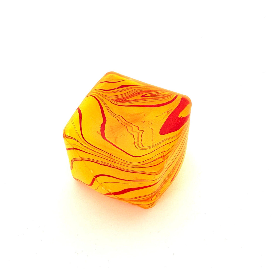 Marbled orange and red stone on a white background