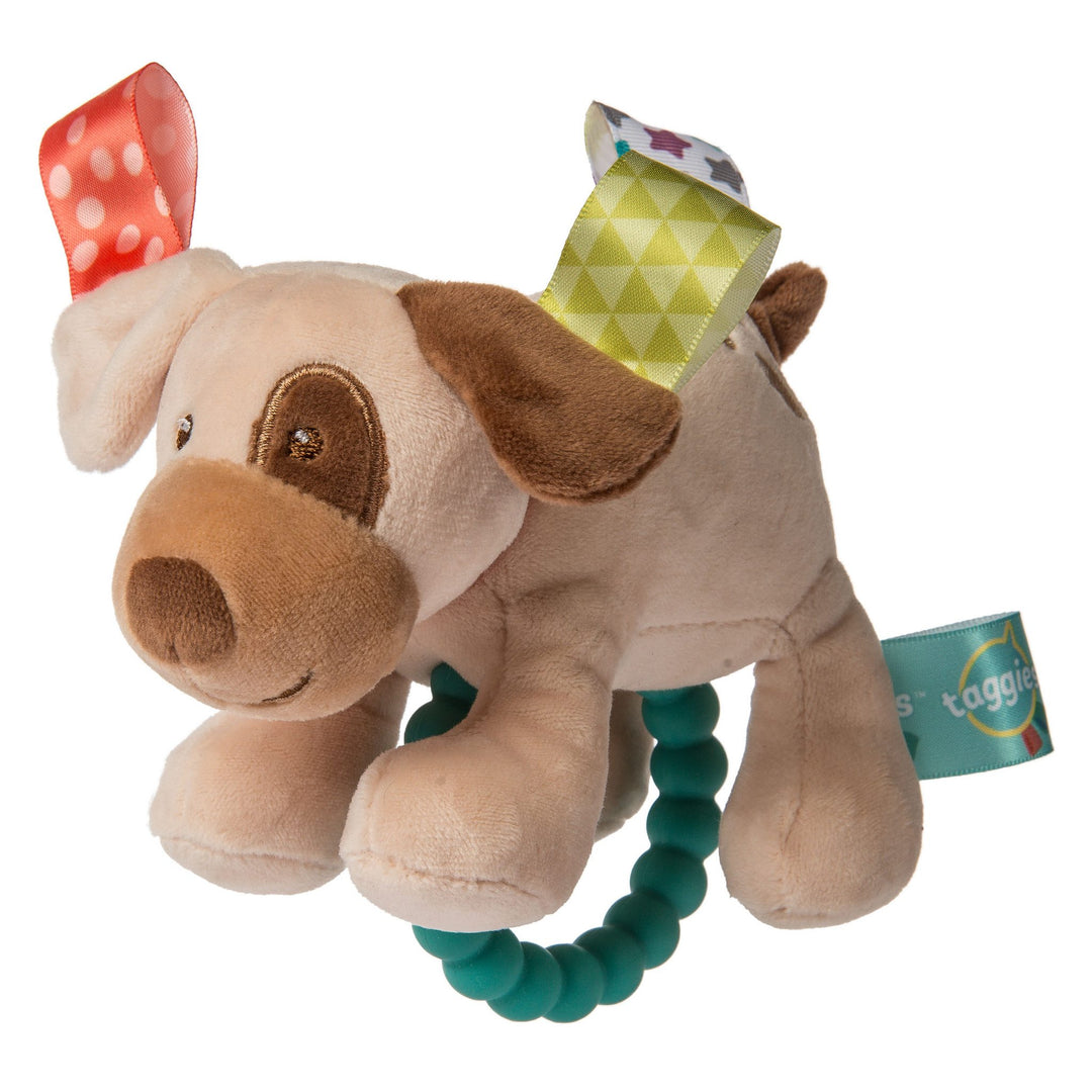 Plush dog toy with a teething ring on a white background
