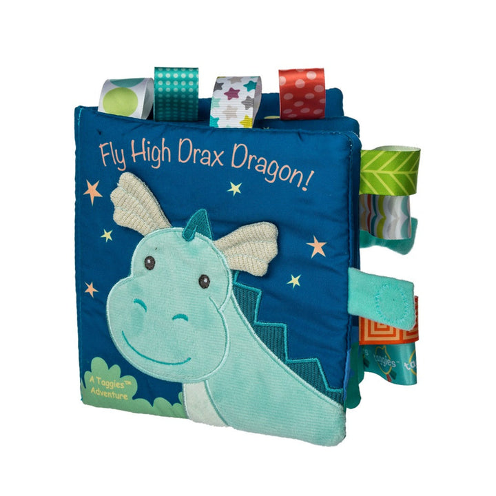 Children's book with a dragon illustration and colorful tabs on a white background
