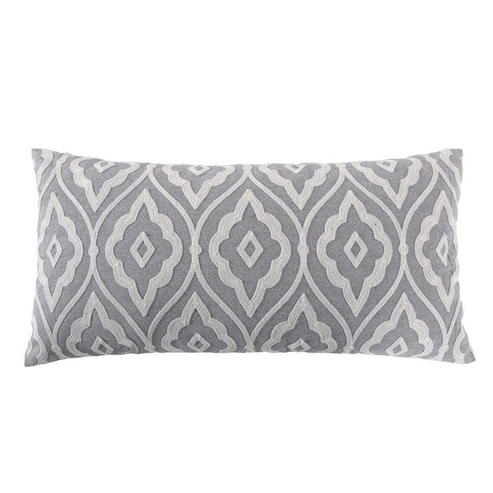 Gray and white patterned pillow on a white background