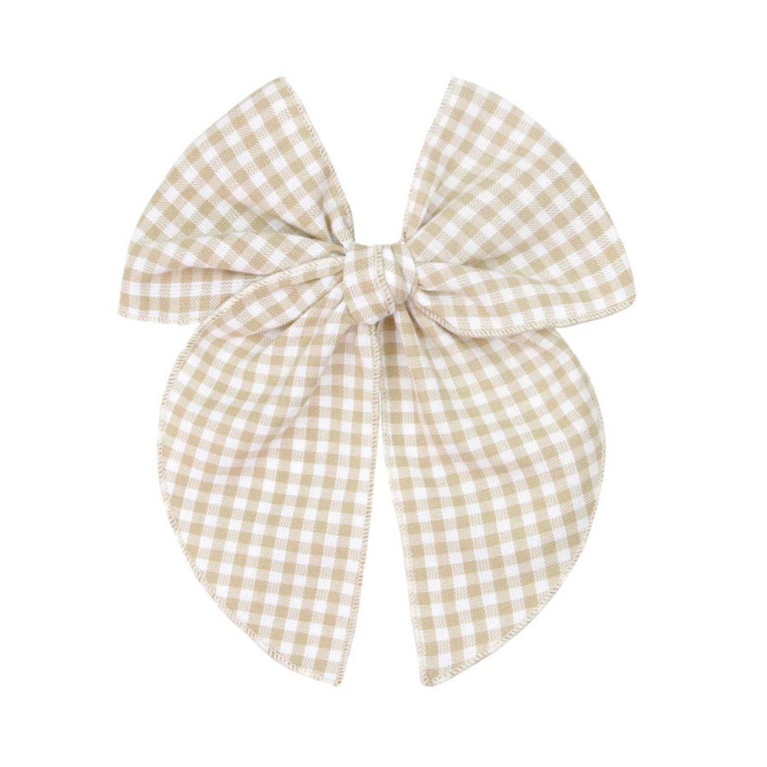 A large beige and white gingham bow with two long tails, shown on a plain white background. A smaller matching gingham bow is partially visible on the left edge.