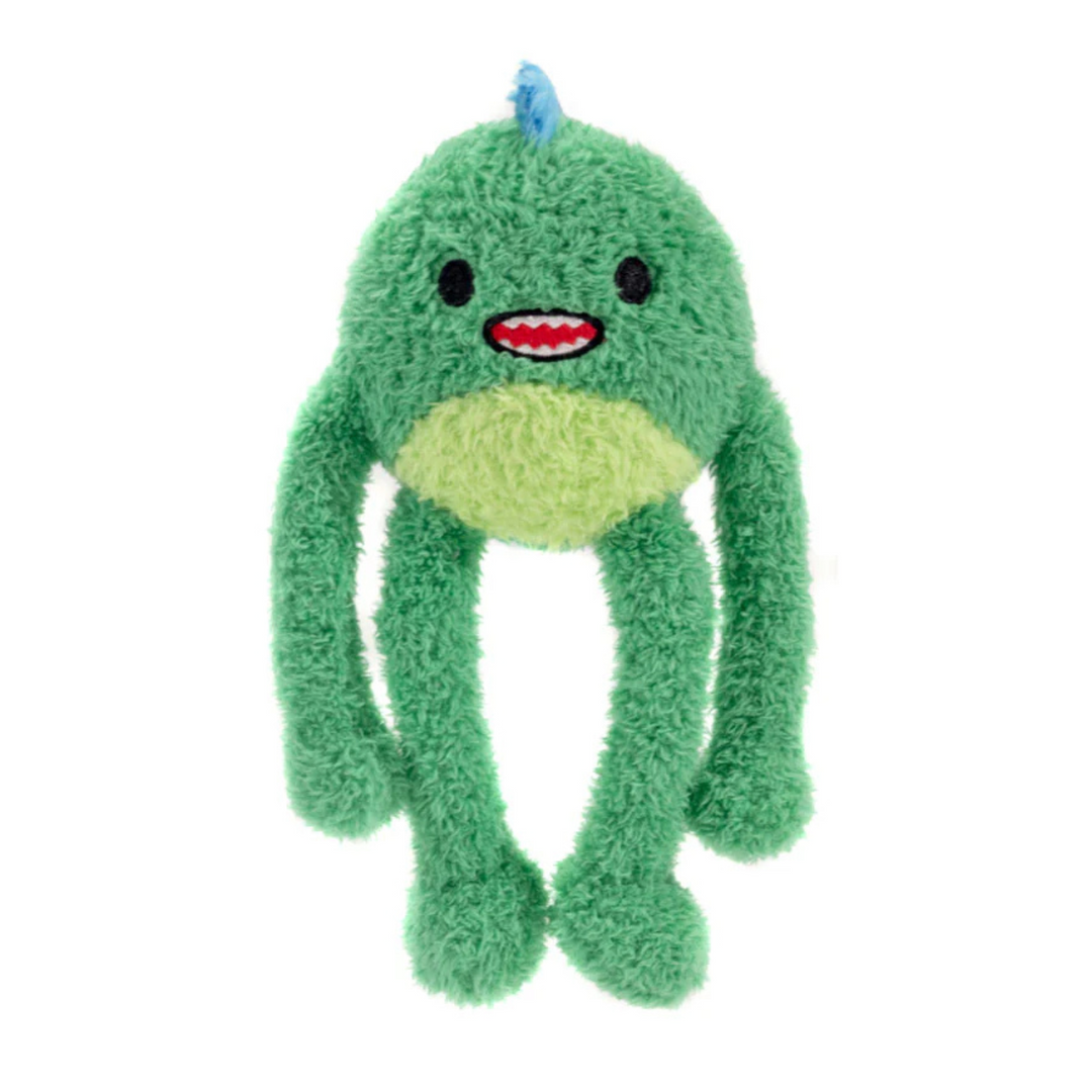 Green plush toy with a happy expression on a white background