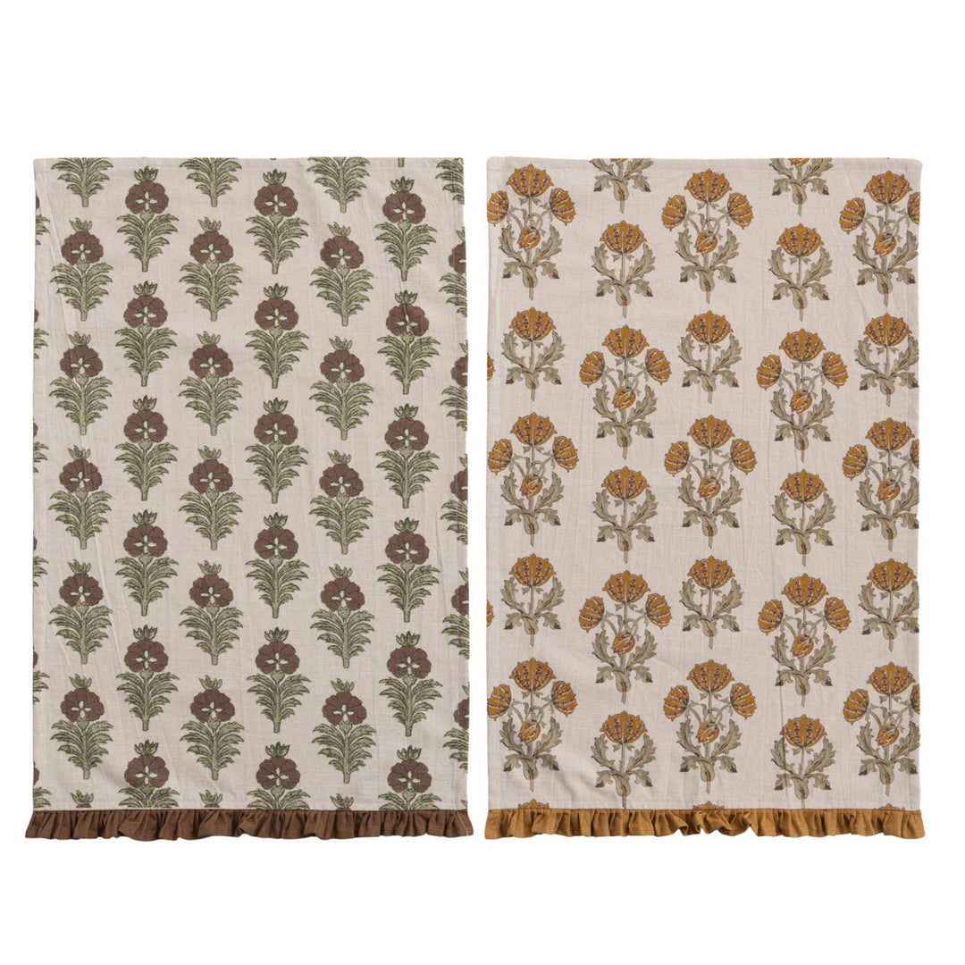 Two patterned fabric swatches on a white background