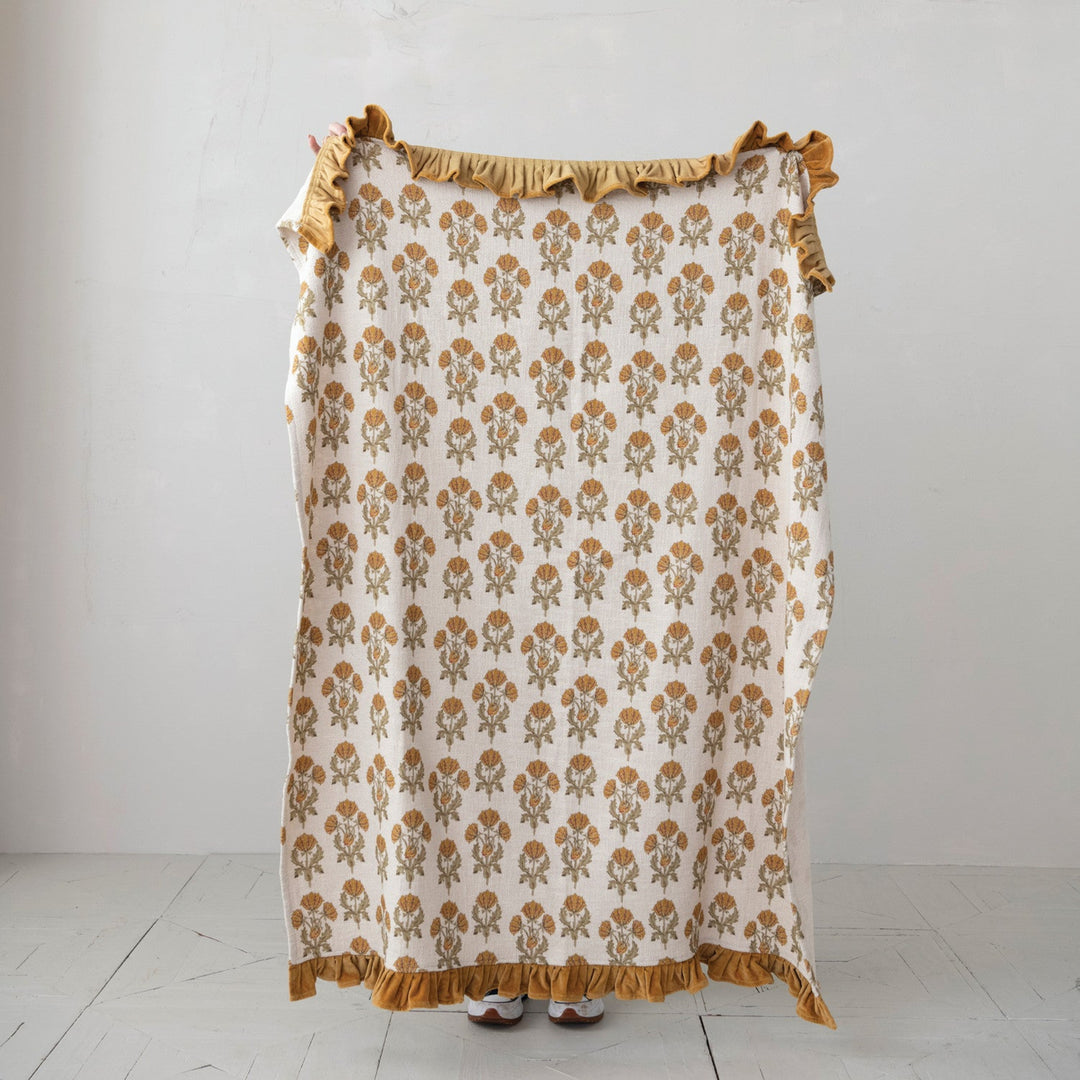 Skirt with floral pattern and ruffled edges on a white background