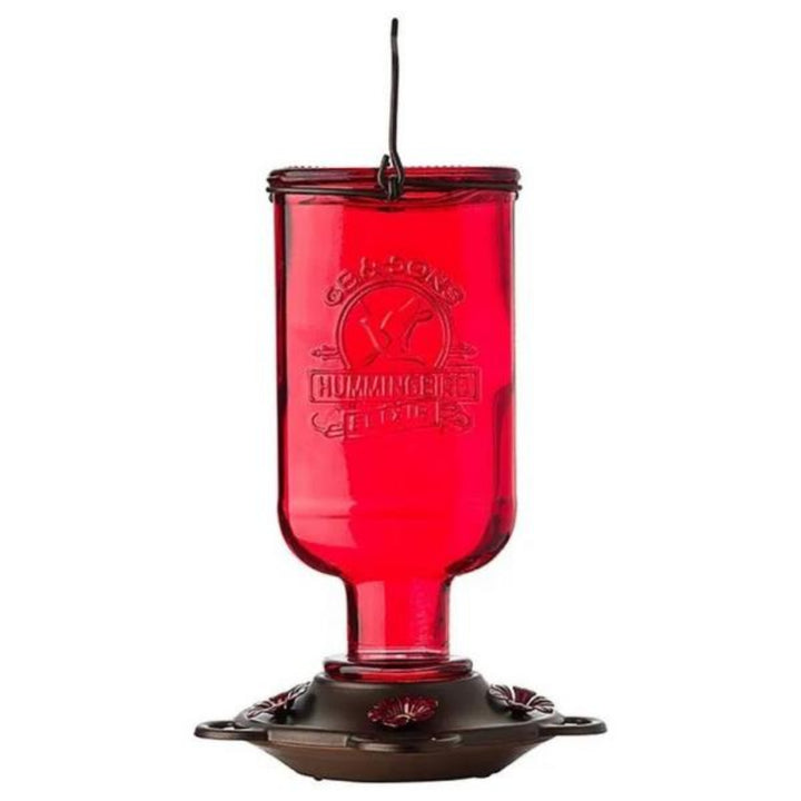 Red hummingbird feeder with brand logo on a white background