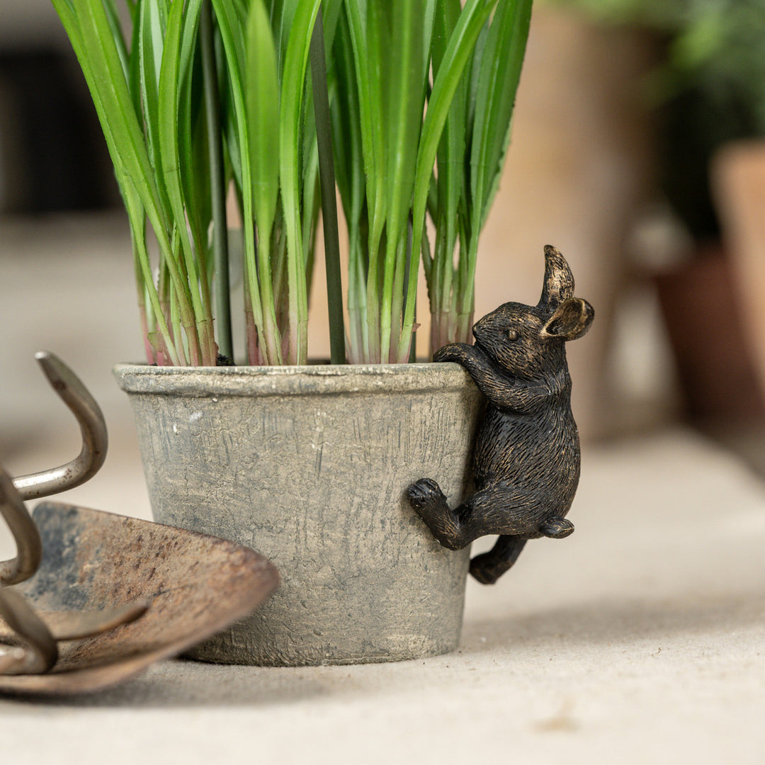 Aged Gold Climbing Bunny Pot Hugger
