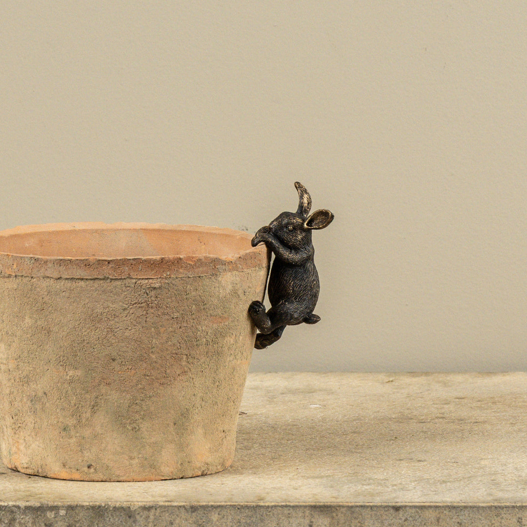 Aged Gold Climbing Bunny Pot Hugger