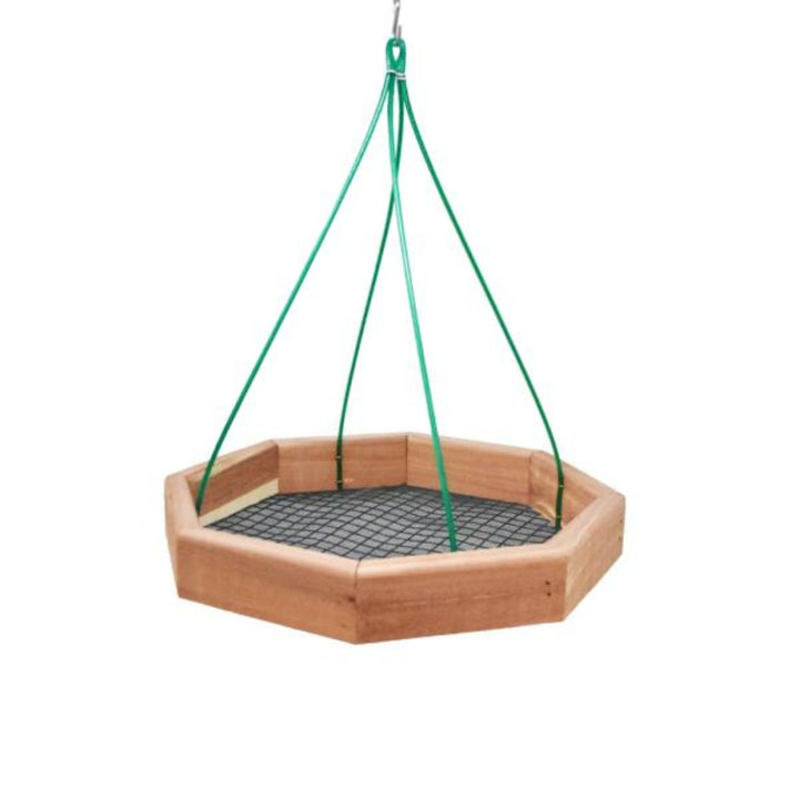 Hexagonal wooden bird feeder with green hanging straps on a white background