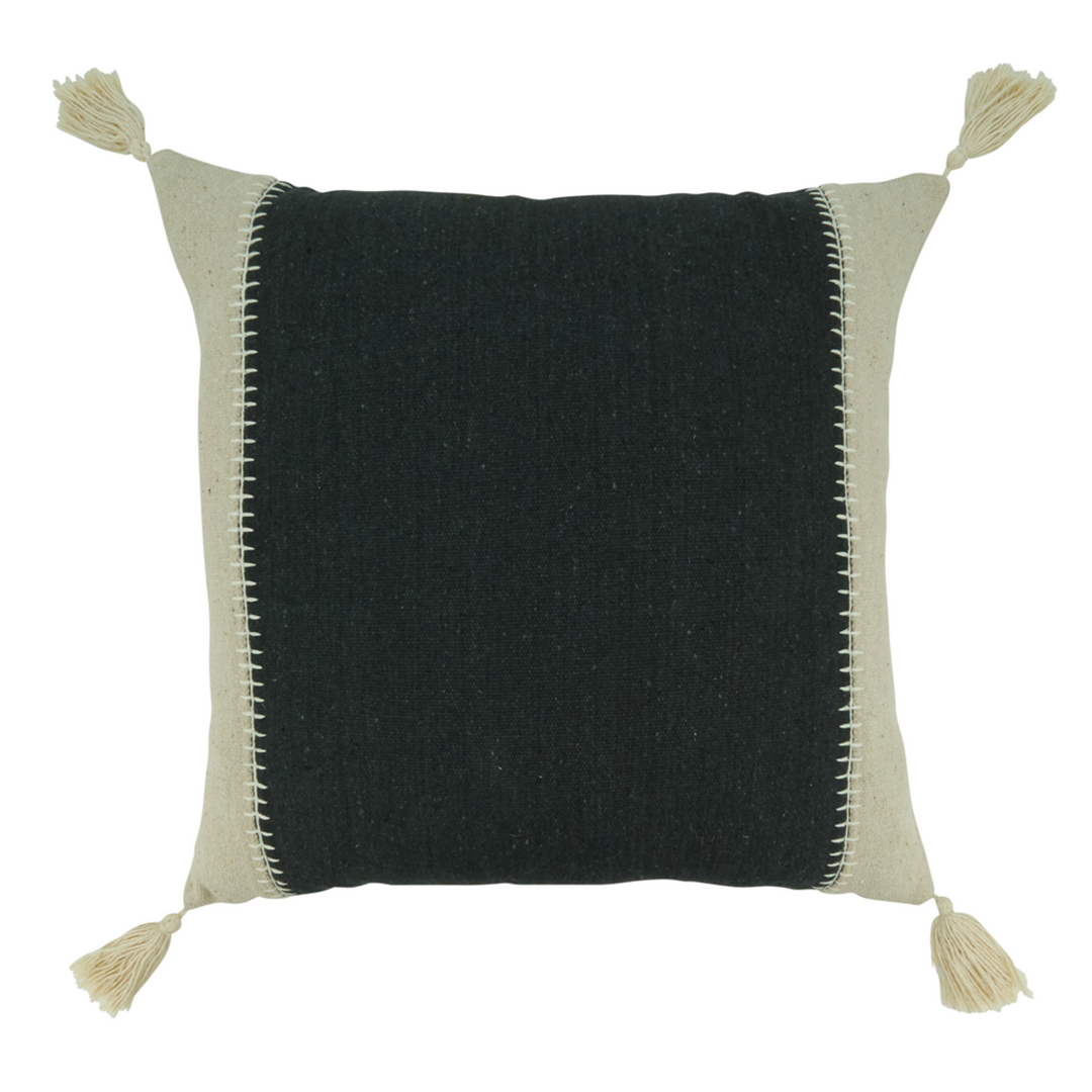 Black pillow with beige edges and tassels on a white background