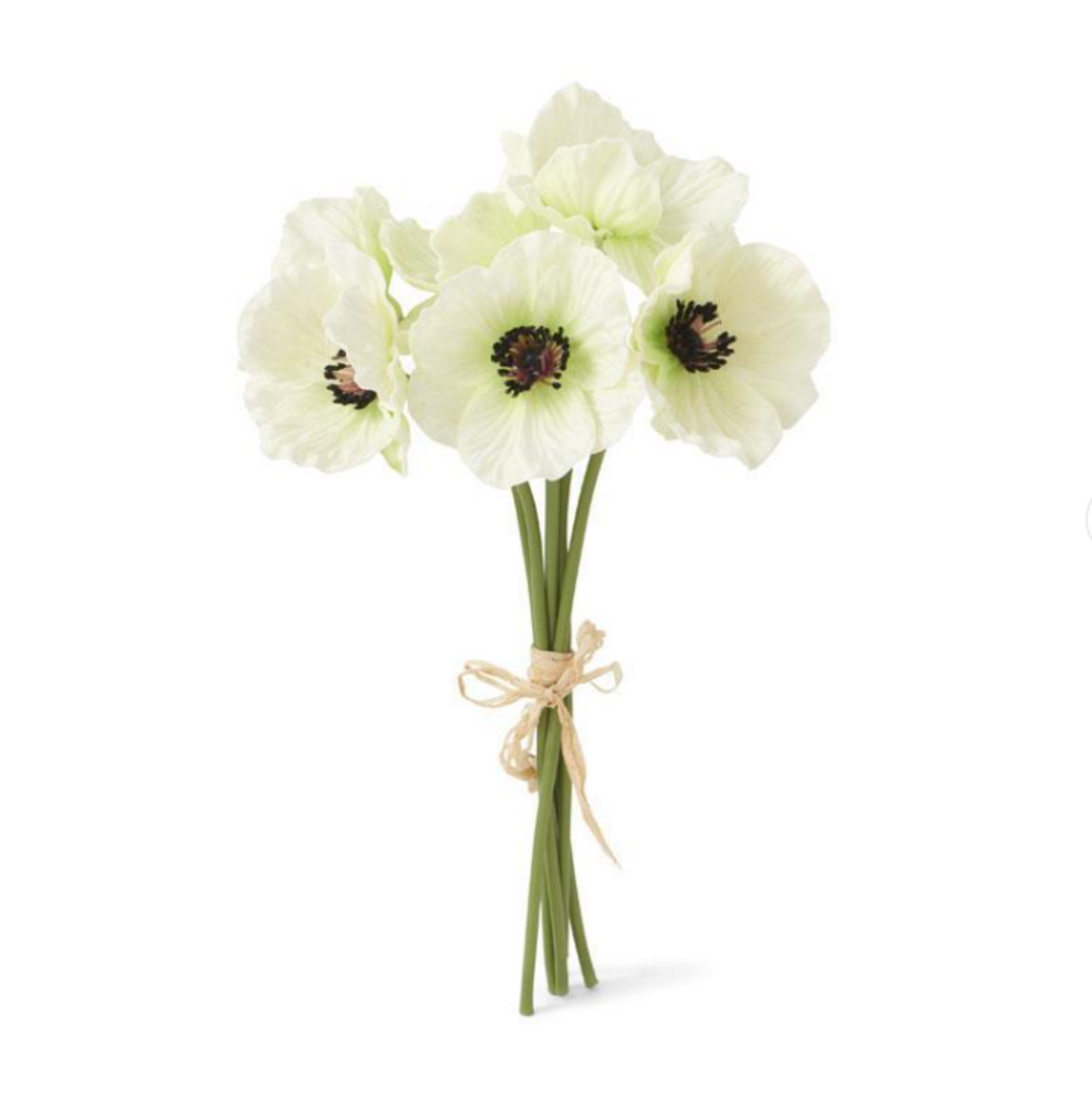 Bouquet of white flowers tied with twine on a white background