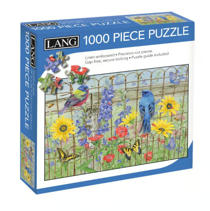 Lang 1000-piece jigsaw puzzle box featuring a colorful garden scene with bluebirds, yellow sunflowers, red flowers, and butterflies.