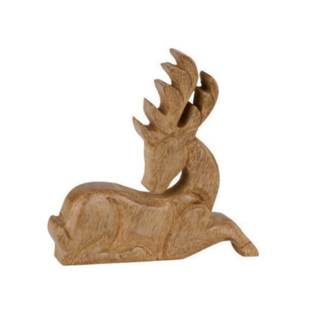 A small carved wooden deer figurine in a resting pose, made from natural light brown wood with visible grain, set against a plain white background.