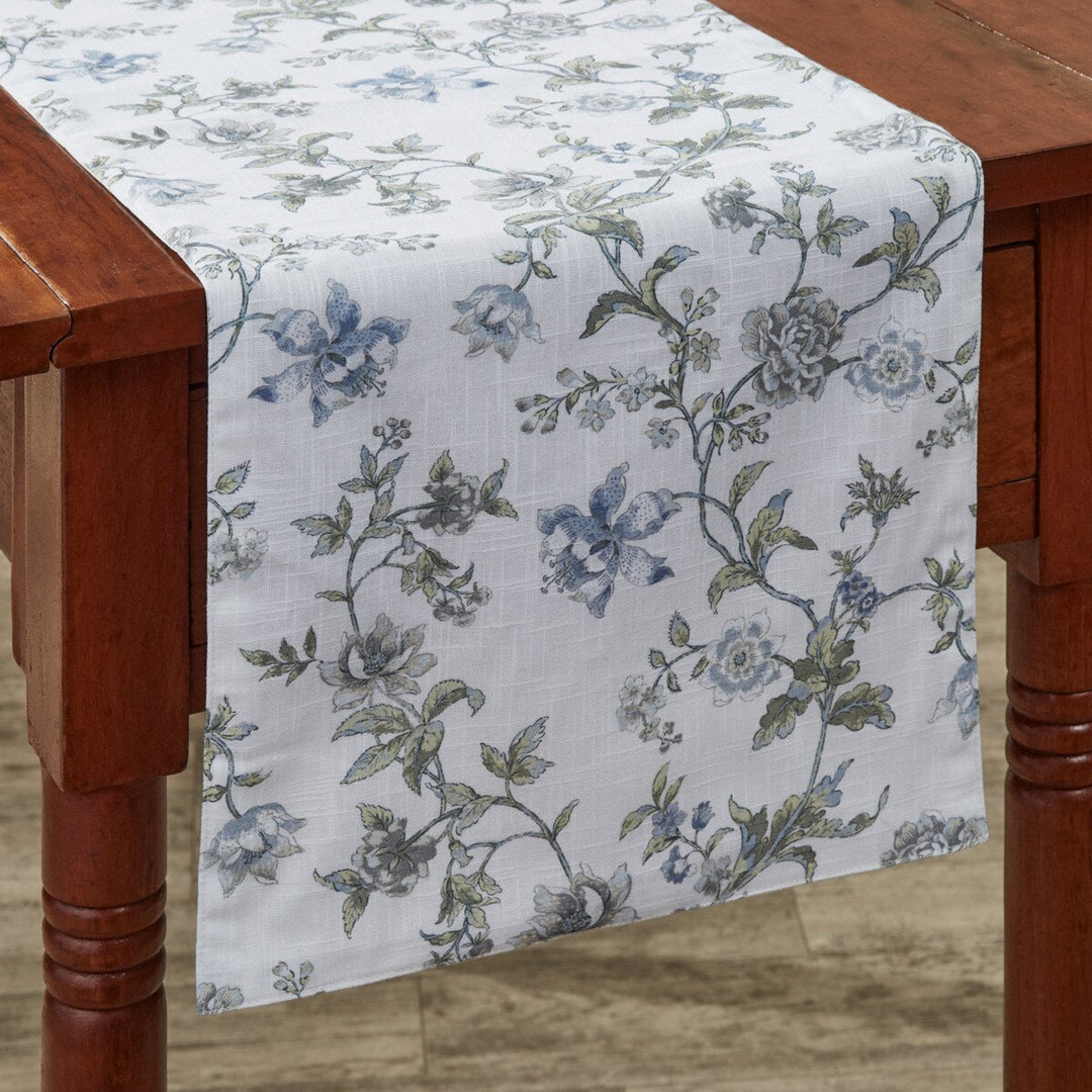 Floral patterned table runner on a wooden table