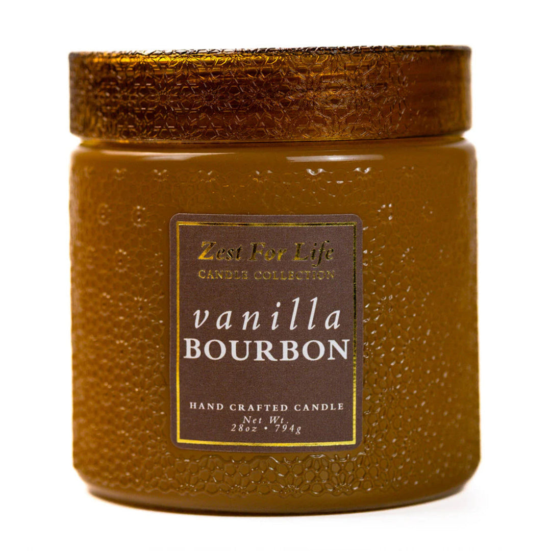 Brown candle jar labeled 'vanilla bourbon' with a textured lid on a white background