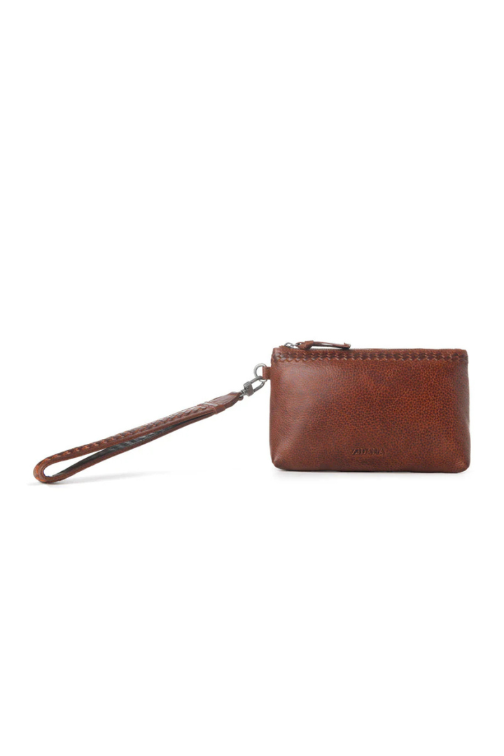 Brown leather wallet with wrist strap on a white background