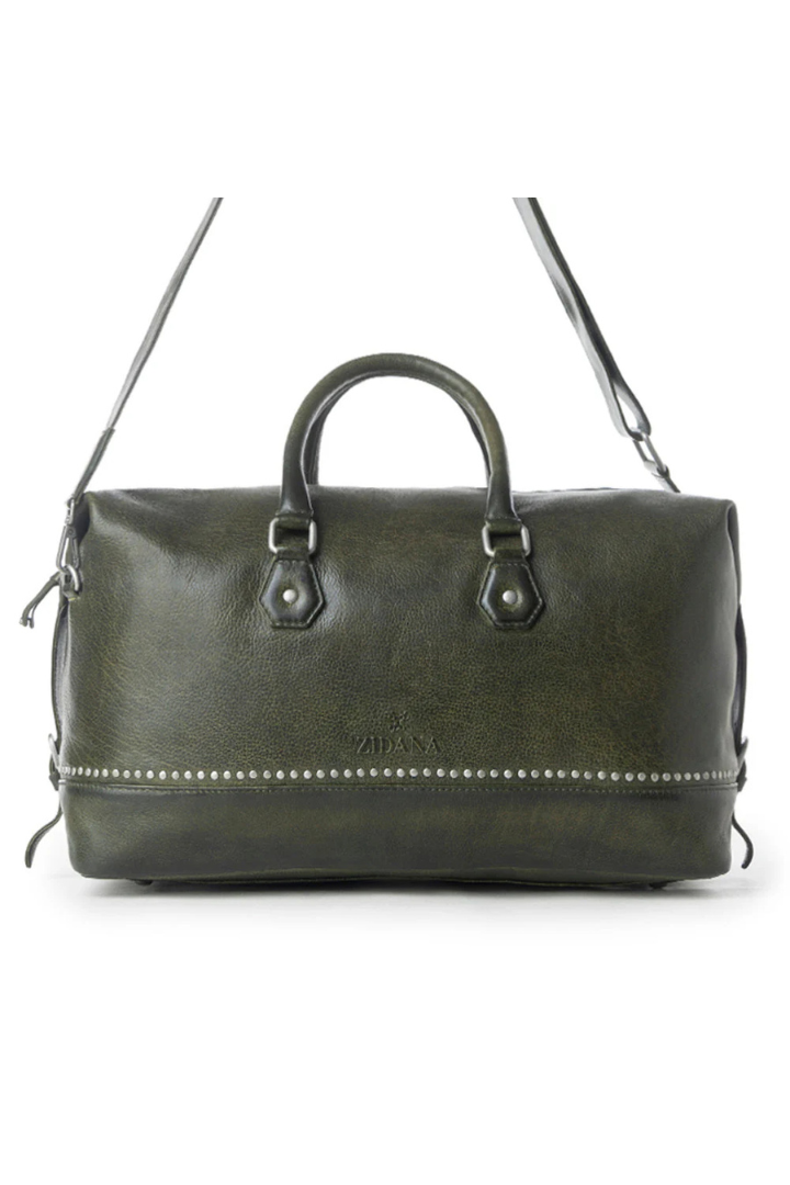 Green leather duffel bag with silver hardware on a white background