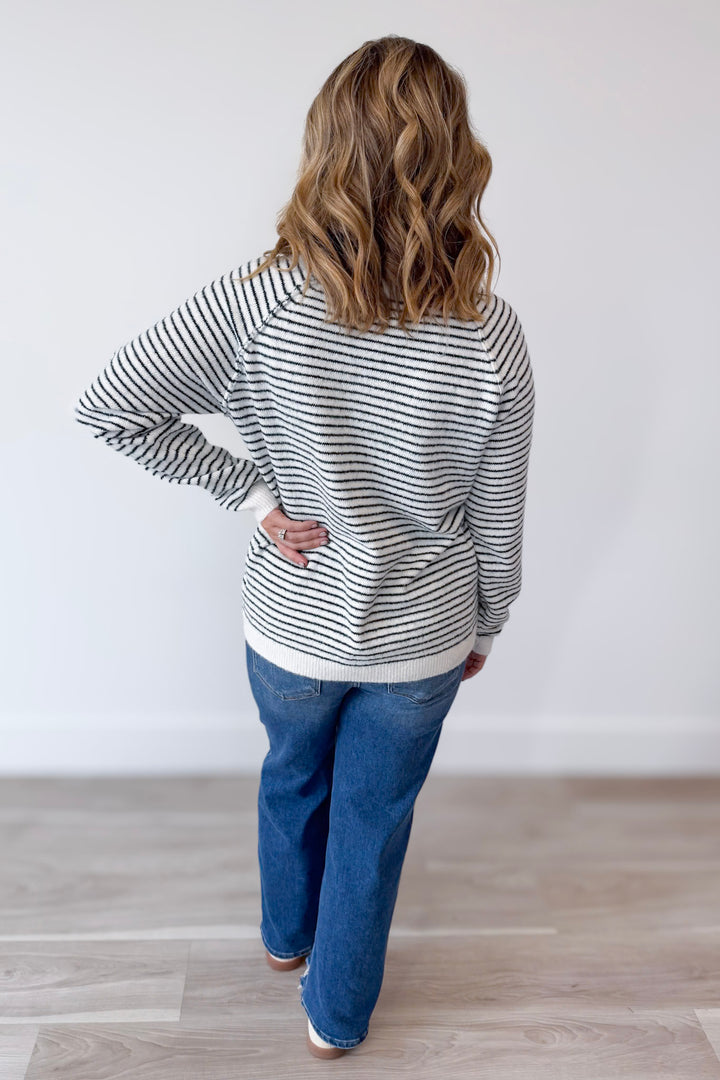 Reaching Out Sweater