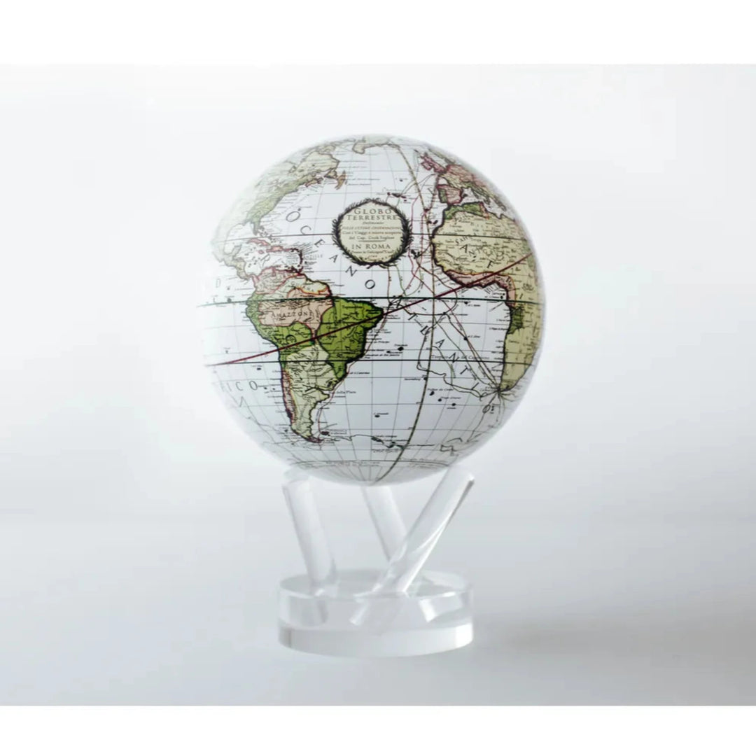 An antique white terrestrial Mova globe with a vintage map, showing the continents and oceans with latitude and longitude lines. The globe is mounted on a clear stand.