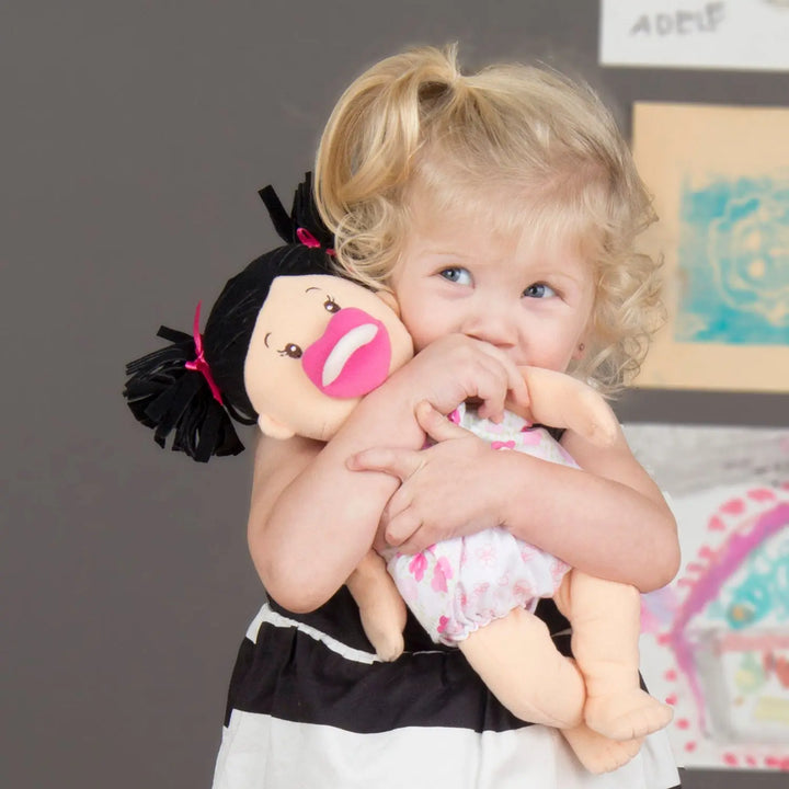 Baby Stella Black Pigtails Peach Doll
